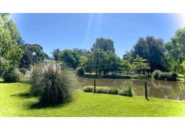 Barrio privado Tierra y mar . El mejor lote disponible frente a la laguna . Orientacion ideal.